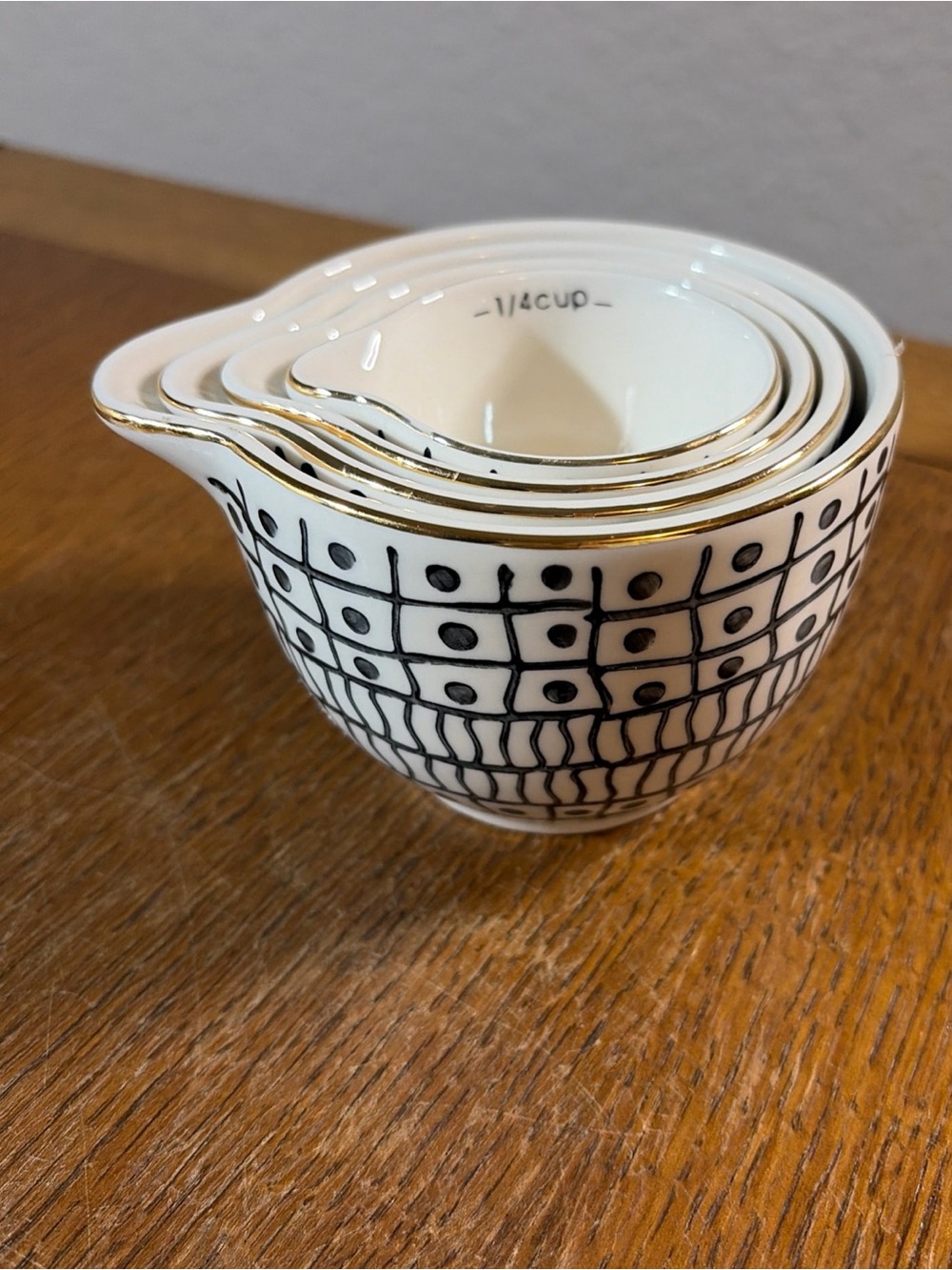 Ceramic Nested Measuring Cups with Black Geometric Pattern and Gold Rim